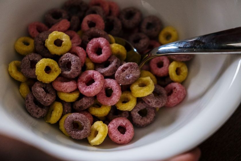 A simple breakfast of toast, fruit and coffee on a kitchen table